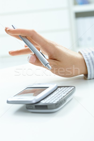 Female hand holding pen Stock photo © nyul
