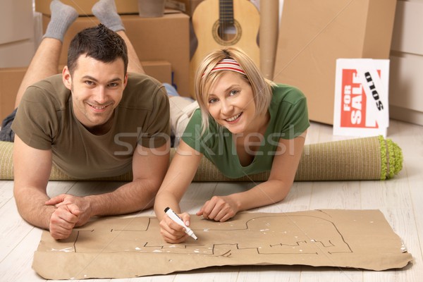 Portret cuplu planificare casa noua zâmbitor podea Imagine de stoc © nyul
