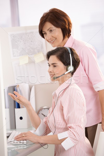 Customer care operator with supervisor Stock photo © nyul