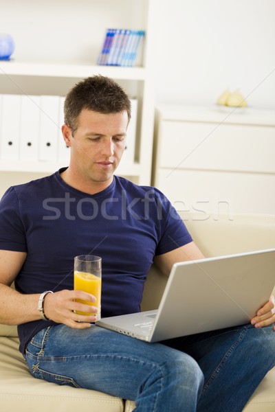Man using laptop computer Stock photo © nyul