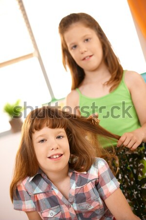 Stockfoto: Jonge · meisjes · genieten · haren · lachend · home