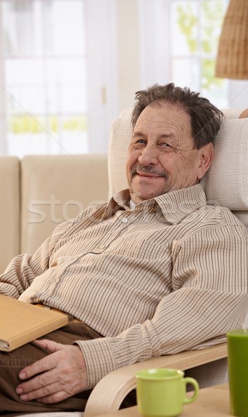 Stock photo: Senior man reading book