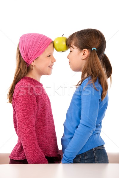 Girls with two apple Stock photo © nyul