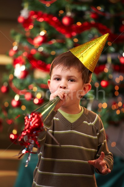 Little boy blowing new year horn Stock photo © nyul