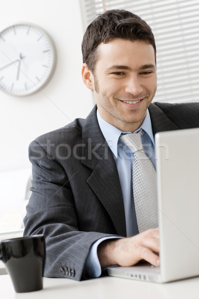 Businessman using laptop Stock photo © nyul