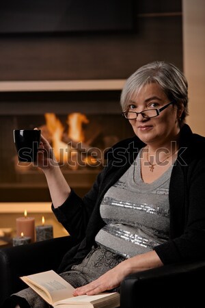 Young businesswoman holding glass of wine Stock photo © nyul