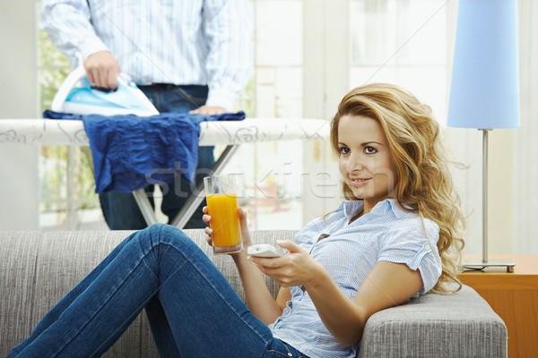 Nő néz tv boldog ül kanapé Stock fotó © nyul