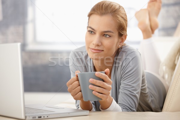 Portrait of dreamy beauty with laptop and coffee Stock photo © nyul