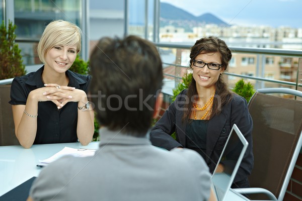 Businesswomen talking on terrace Stock photo © nyul