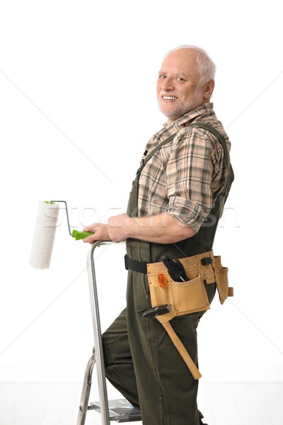 Senior man painting home Stock photo © nyul