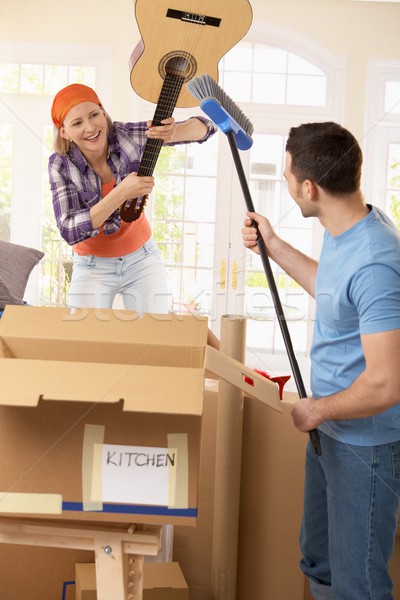Couple pretending to fight at moving house Stock photo © nyul