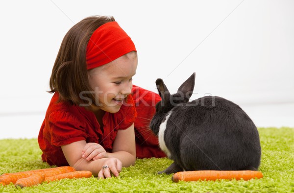 Little girl coelhinho da páscoa páscoa imagem sorridente verde Foto stock © nyul