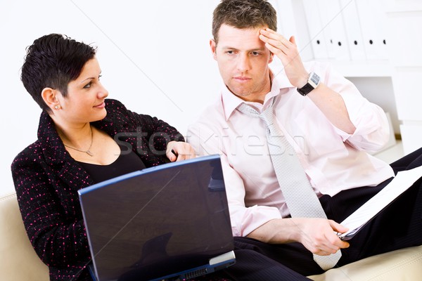 üzletemberek néz problémás üzletember üzletasszony együtt dolgozni Stock fotó © nyul