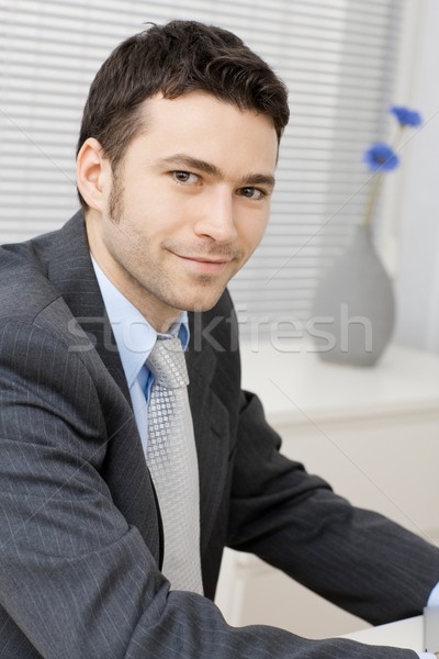 Smiling young businessman Stock photo © nyul