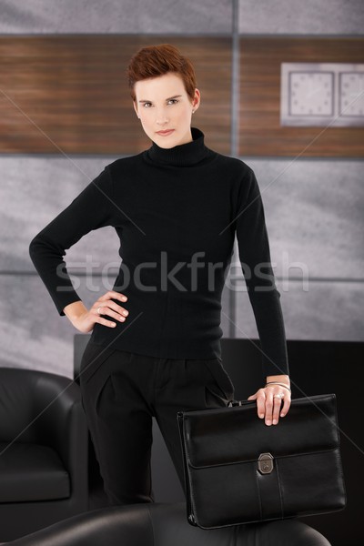 Stylish businesswoman posing in office Stock photo © nyul