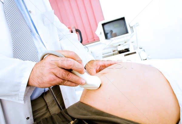 Examen medical gravidă burtă familie medical Imagine de stoc © nyul