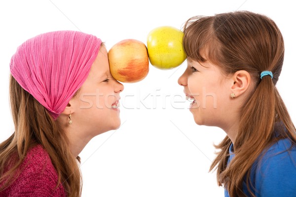Lányok kettő alma nevet kicsi szemben Stock fotó © nyul