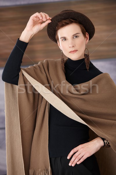 Stock photo: Young trendy woman in hat 
