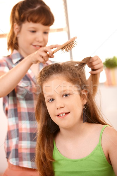 Small girl getting hair comb Stock photo © nyul