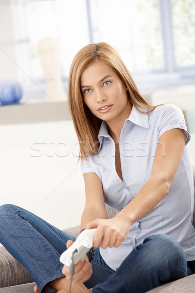 Attractive woman playing computer game Stock photo © nyul