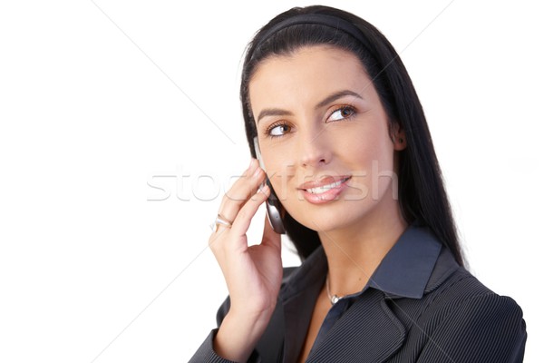 Stock photo: Happy businesswoman with cellphone�