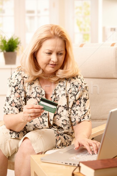 Elderly woman shopping on internet Stock photo © nyul