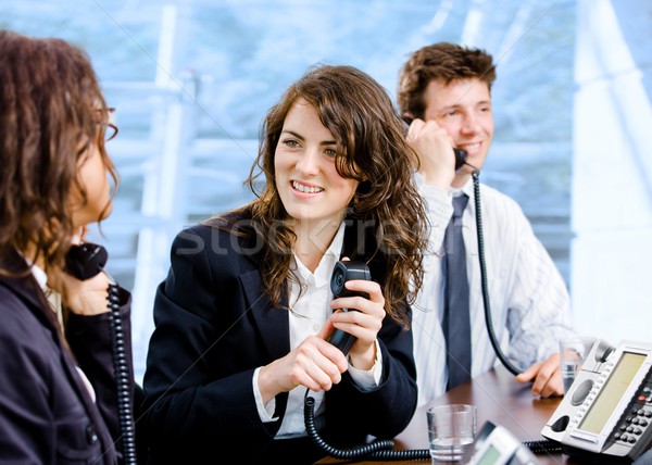 ügyfélszolgálat csapat boldog hív telefon üzlet Stock fotó © nyul