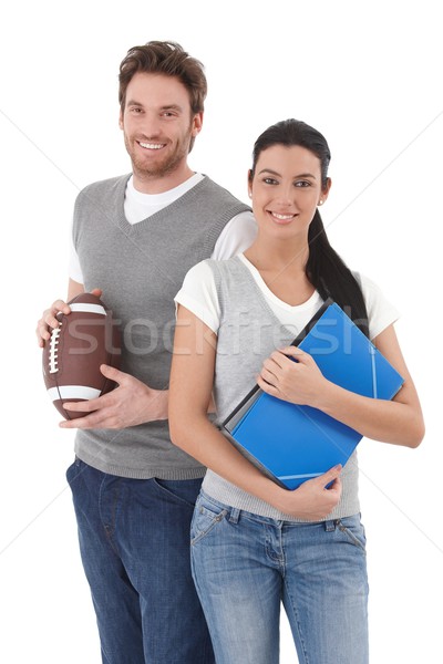 University students holding folders and rugby ball Stock photo © nyul