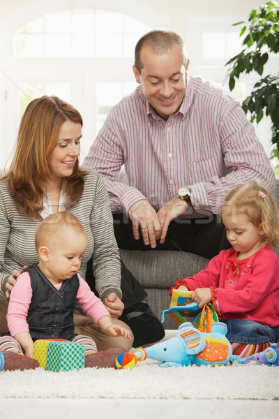 Happy family with baby and toddler Stock photo © nyul