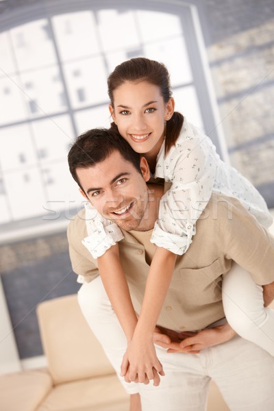 Happy couple having fun at home Stock photo © nyul