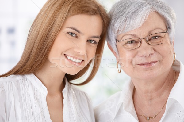 Closeup portrait of young woman and mother smiling Stock photo © nyul