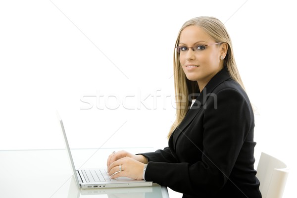 Businesswoman working on laptop Stock photo © nyul