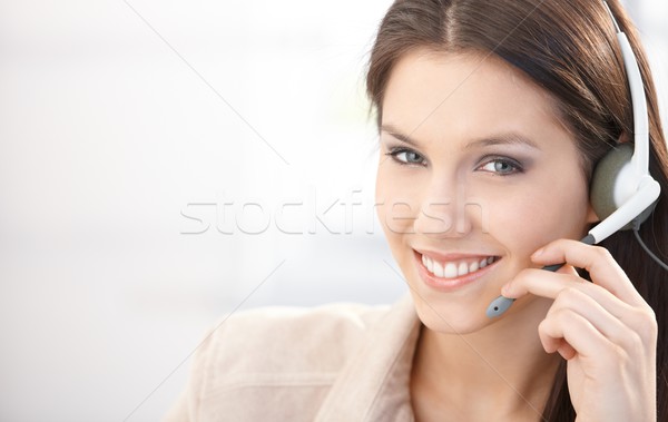 Stock photo: Happy dispatcher working in call center 