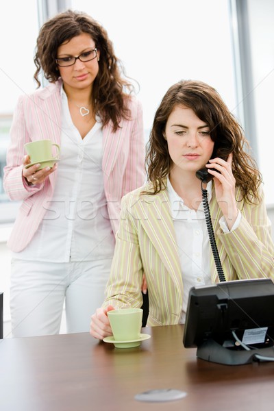 Businesswomen talking on phone Stock photo © nyul