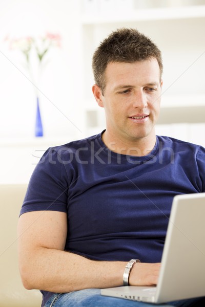 Man using laptop computer Stock photo © nyul