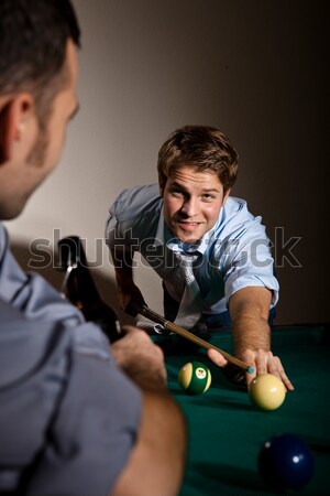 Genç erkekler oynama snooker oyun sarışın adam Stok fotoğraf © nyul