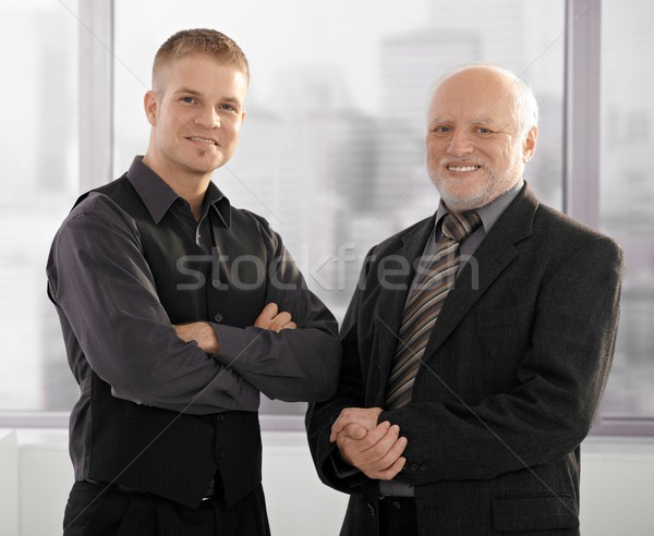 Stock photo: Portrait of senior and junior businessmen