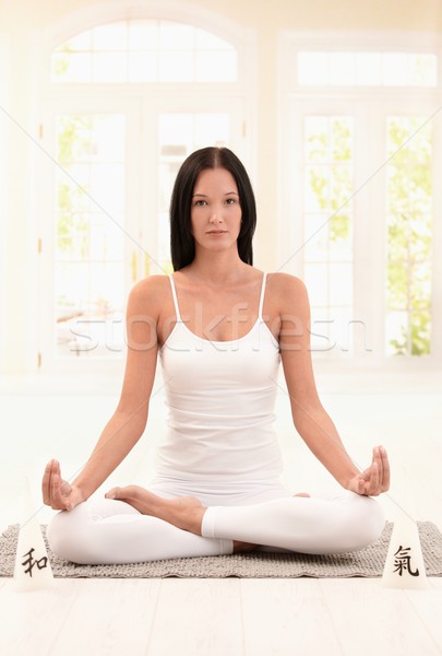 Attractive woman practicing yoga Stock photo © nyul