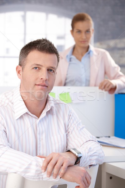 Stock photo: Portrait of middle-aged office worker smiling�