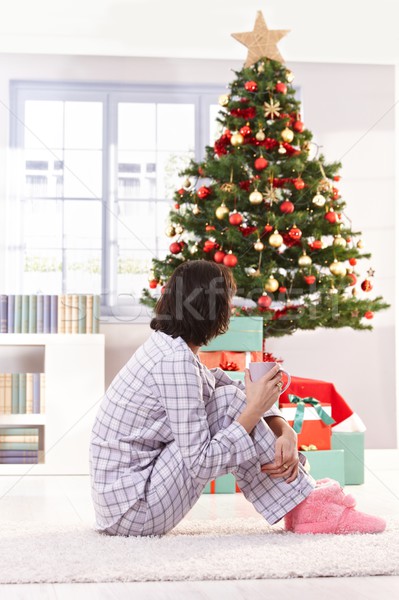 Woman in pyjama on christmas morning Stock photo © nyul