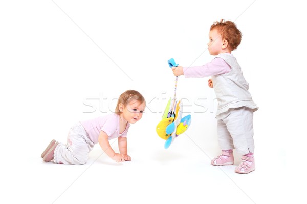 Babák játék játékok egyéves lánycsecsemők élvezi Stock fotó © nyul