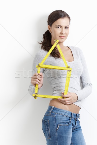 Sexy girl posing with folding rule smiling Stock photo © nyul