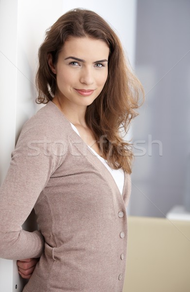Attractive woman smiling happily at home Stock photo © nyul