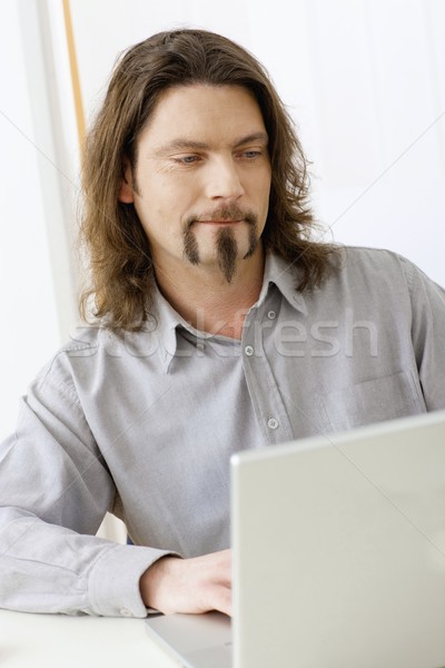 Businessman working with laptop Stock photo © nyul