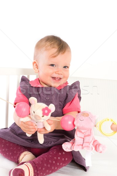 Baby Girl playing in bed Stock photo © nyul