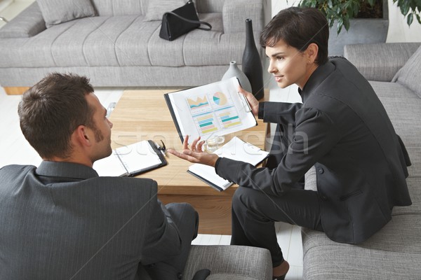 Businesspeople discussing charts Stock photo © nyul
