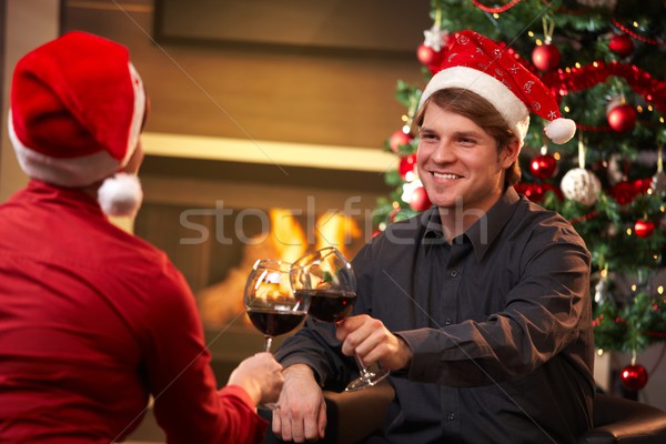 [[stock_photo]]: Heureux · couple · célébrer · Noël · jeunes · vin