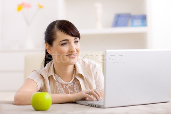 Woman using laptop computer Stock photo © nyul