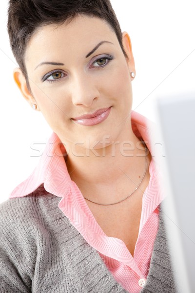 Boldog üzletasszony számítógéphasználat irodai asztal laptopot használ számítógép Stock fotó © nyul