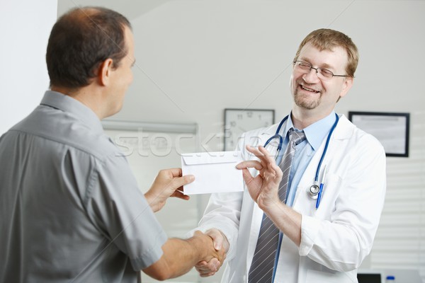 Beteg orvos orvosi iroda pénz boríték Stock fotó © nyul